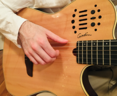 finger picking arm and hand position